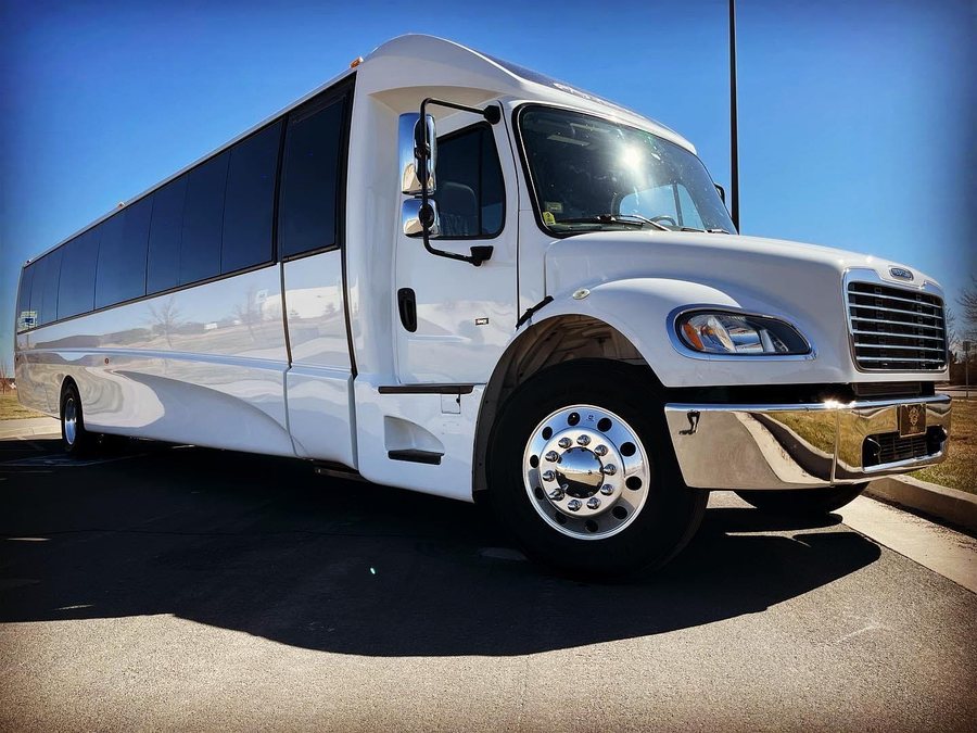 Party bus exterior, white 30-passenger coach